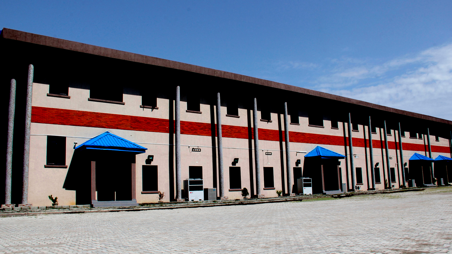 Young Black students studying and walking together on the Maranatha University Lagos campus